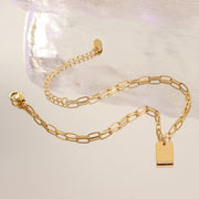 Good Luck Charm Anklet for Women — 18K Gold Plated, Square Pendant, Beach Jewelry on model